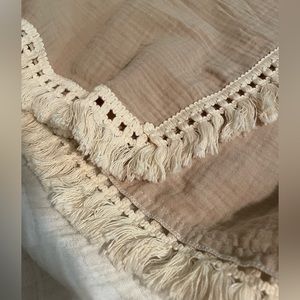 Fringe newborn swaddle